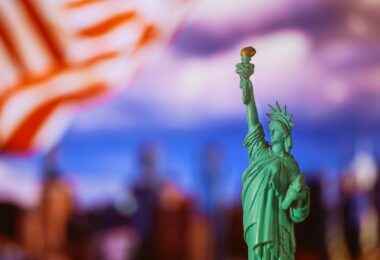 Statue of Liberty with flag of the United States of America at New York City