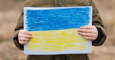 War of Russia against Ukraine. Ukrainian Crying boy asks to stop the war in Ukraine.