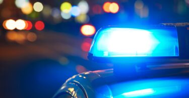 Police car on the street at night
