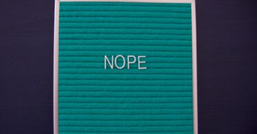 Nope text on sign letter board