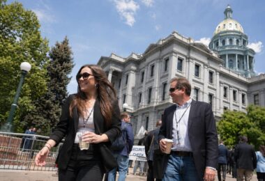 Colorado State Capitol hearing room after vote on residential lot-size bill